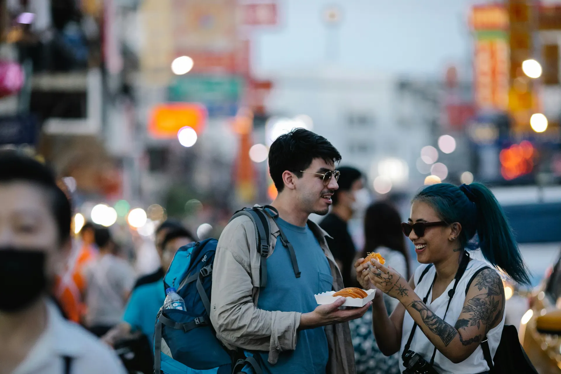 Travellers enjoying a warm English city evening